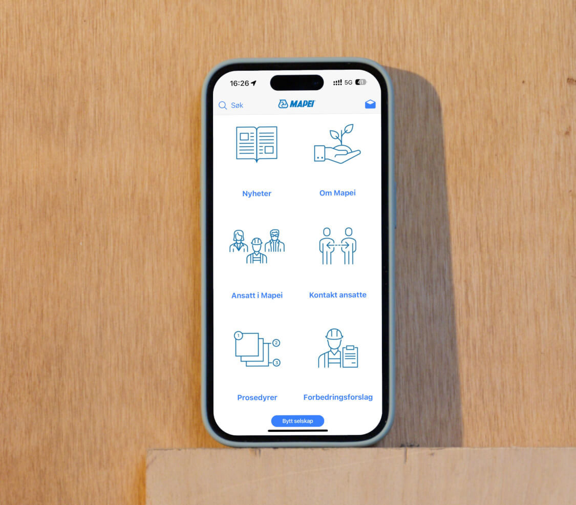 iPhone med Mapei sin app for ansatte. Foto.